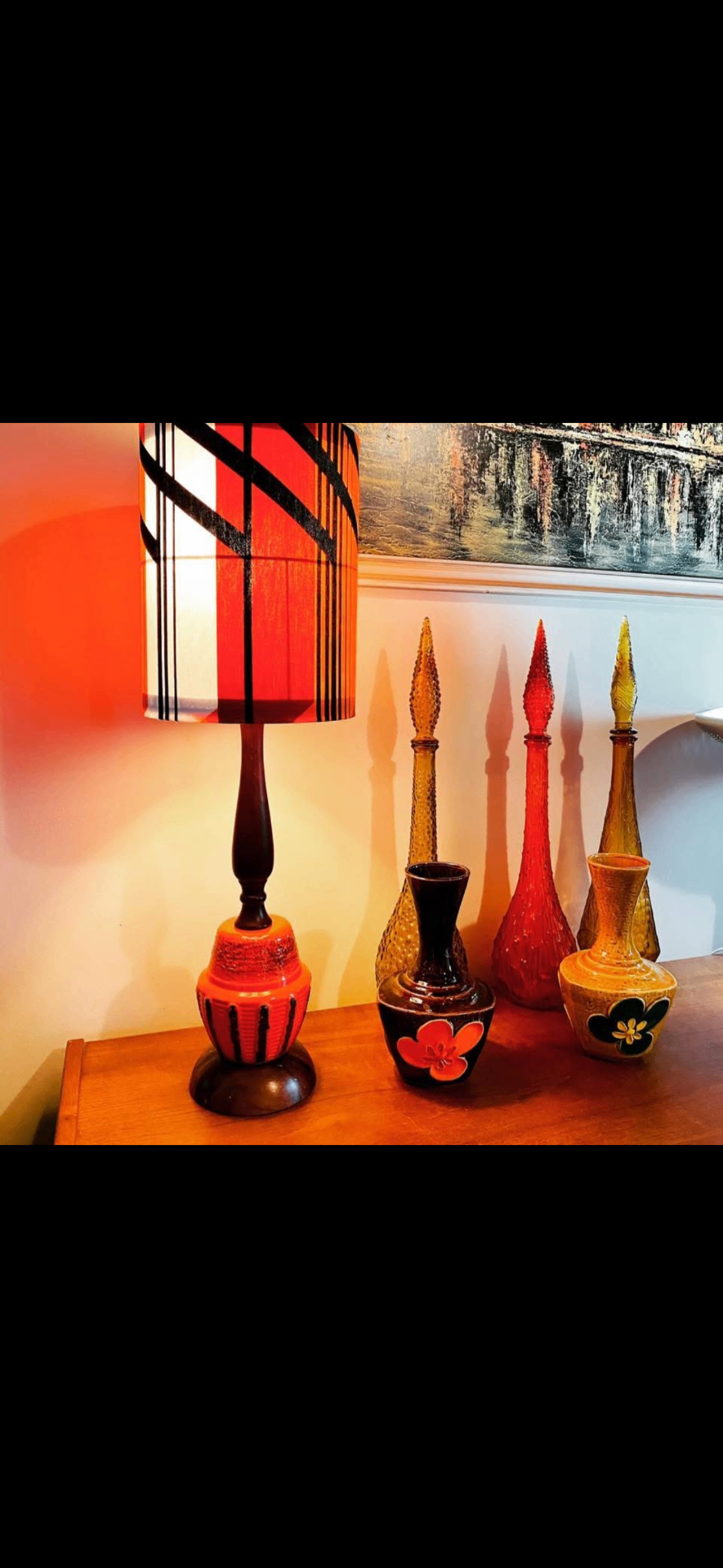 Reimagined Ellis lamp with an original handcrafted 1960s geometric shade, alongside warm-toned glass vessels.
